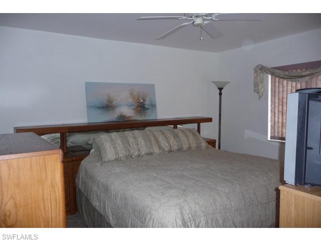 5697 Rattlesnake Hammock Road, Unit C106 Naples, FL 34113 - Photo 5 of 11 Master Bedroom