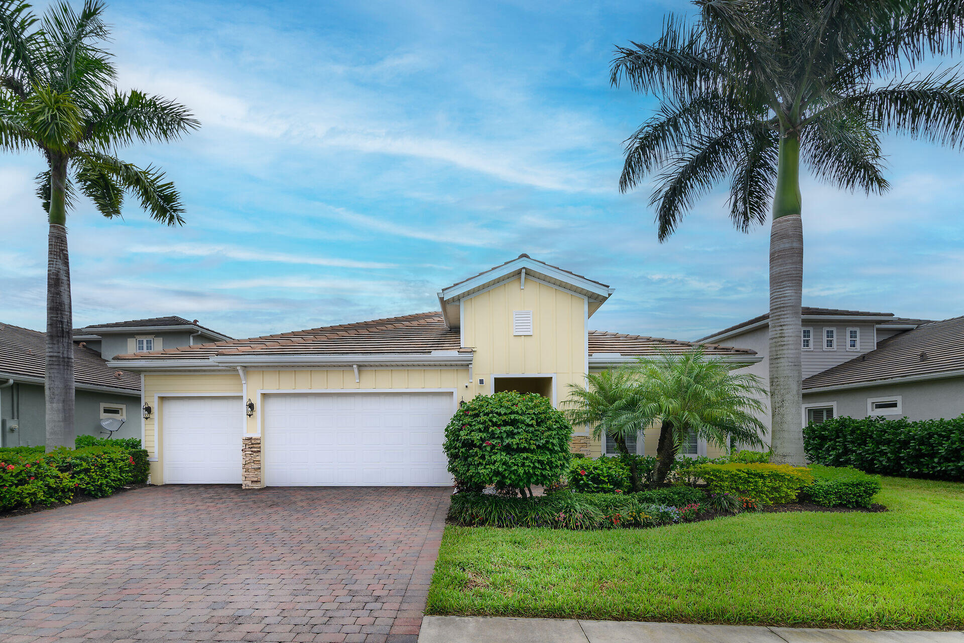 14730 Nautilus Place Naples, FL 34114 - Photo 1 of 56 a front view of a house with a yard and garage