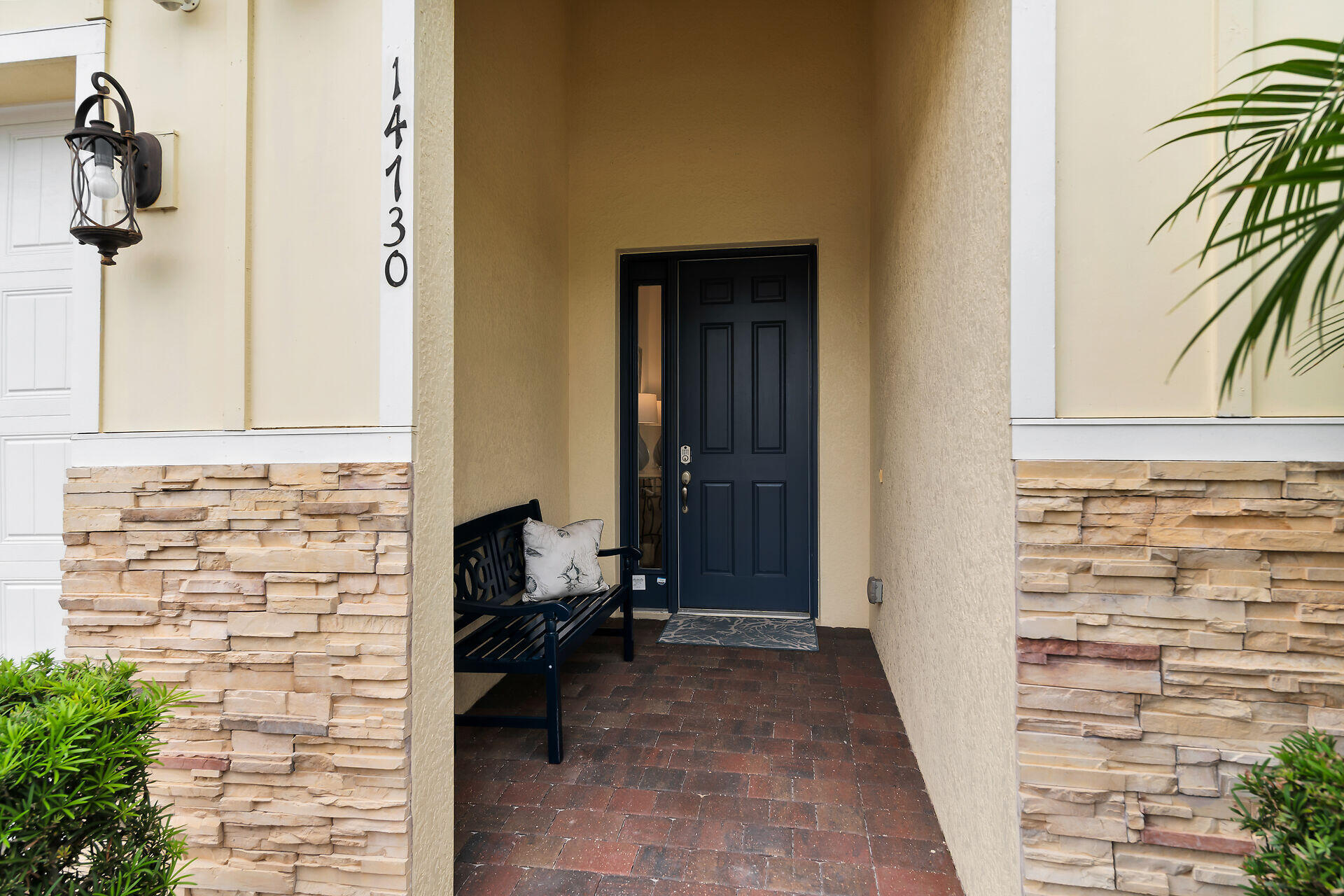 14730 Nautilus Place Naples, FL 34114 - Photo 2 of 56 a view of a entryway door of the house