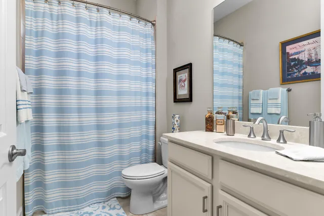 a bedroom with a bed and cabinets