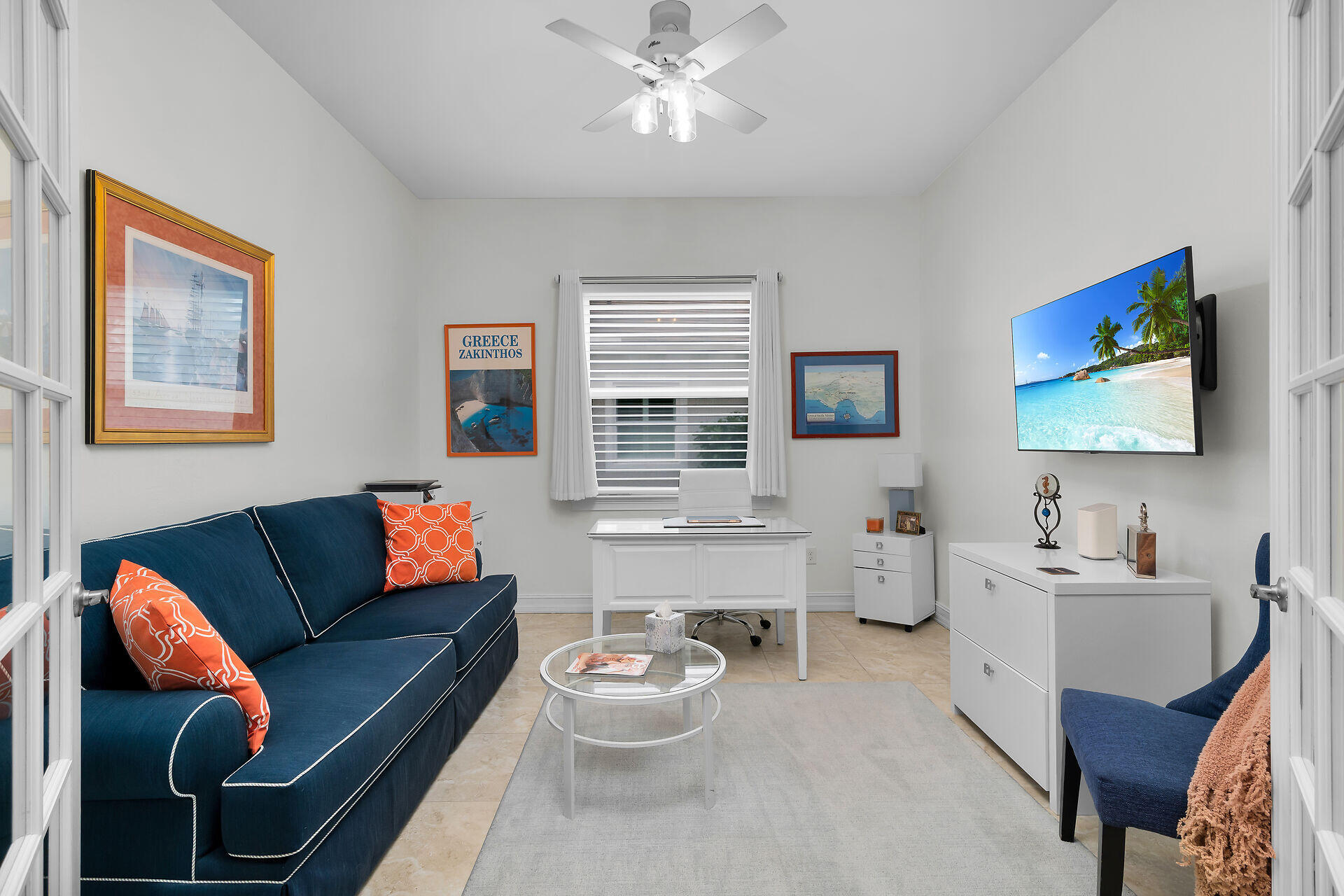 14730 Nautilus Place Naples, FL 34114 - Photo 25 of 56 a living room with furniture and a large window
