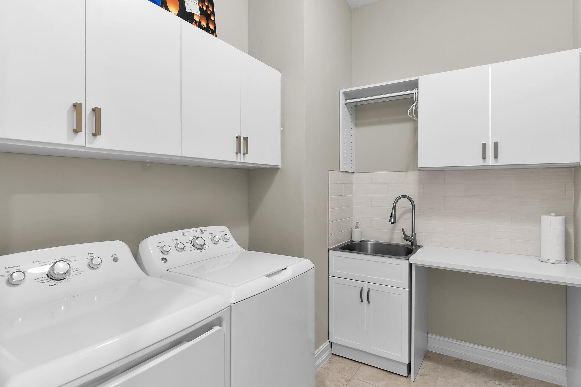 14730 Nautilus Place Naples, FL 34114 - Photo 28 of 56 a view of cabinets with sink