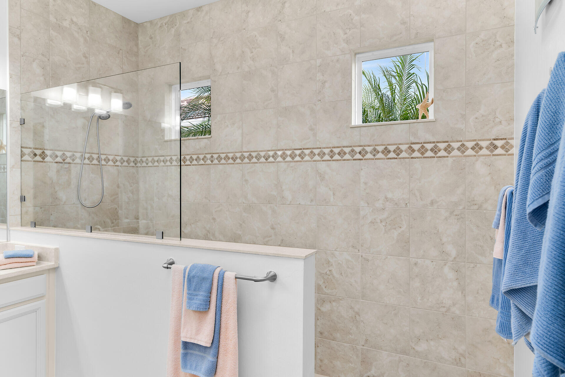 14730 Nautilus Place Naples, FL 34114 - Photo 34 of 56 a bathroom with a shower and a sink