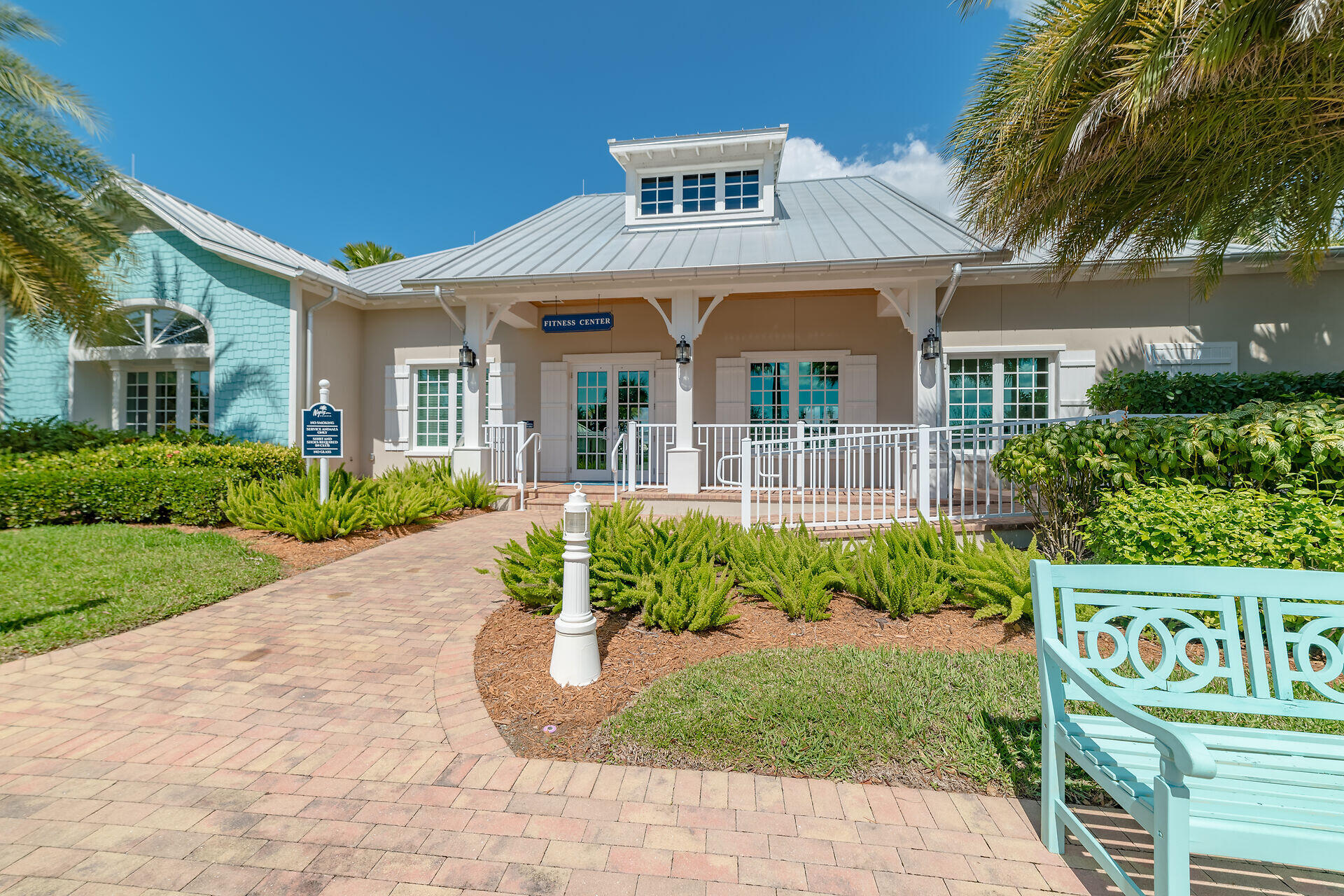 14730 Nautilus Place Naples, FL 34114 - Photo 44 of 56 a front view of a house with garden