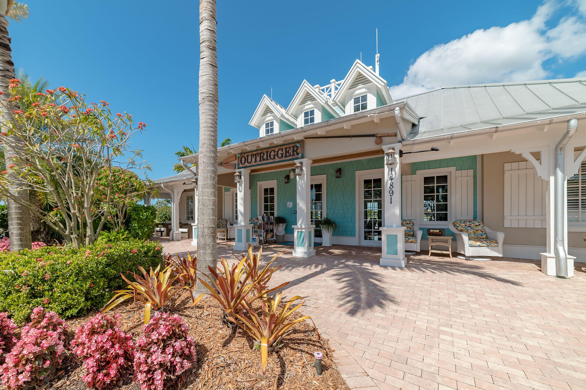 14730 Nautilus Place Naples, FL 34114 - Photo 50 of 56 a view of a house with patio outdoor seating