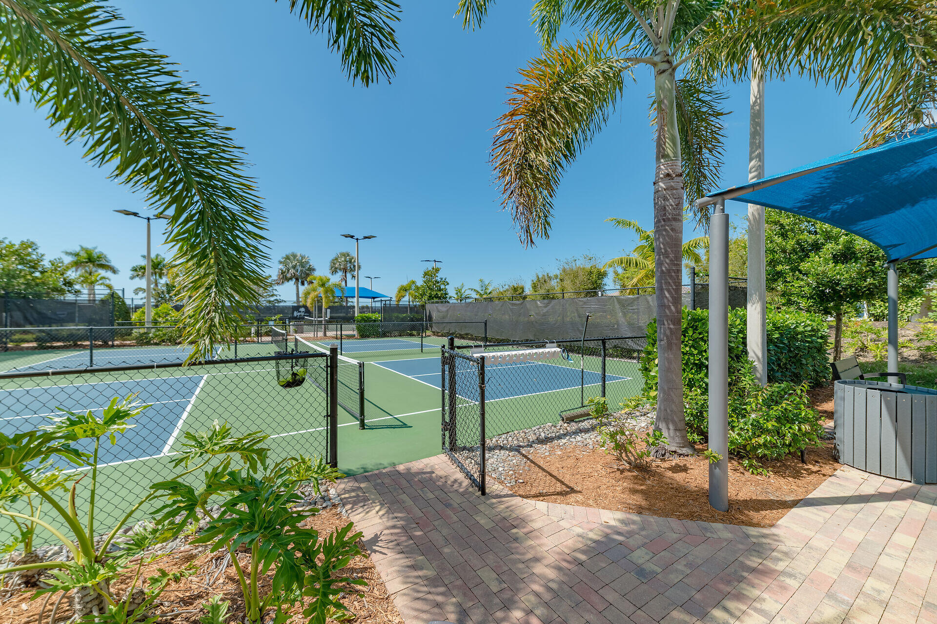 14730 Nautilus Place Naples, FL 34114 - Photo 52 of 56 a view of a park with plants and palm trees