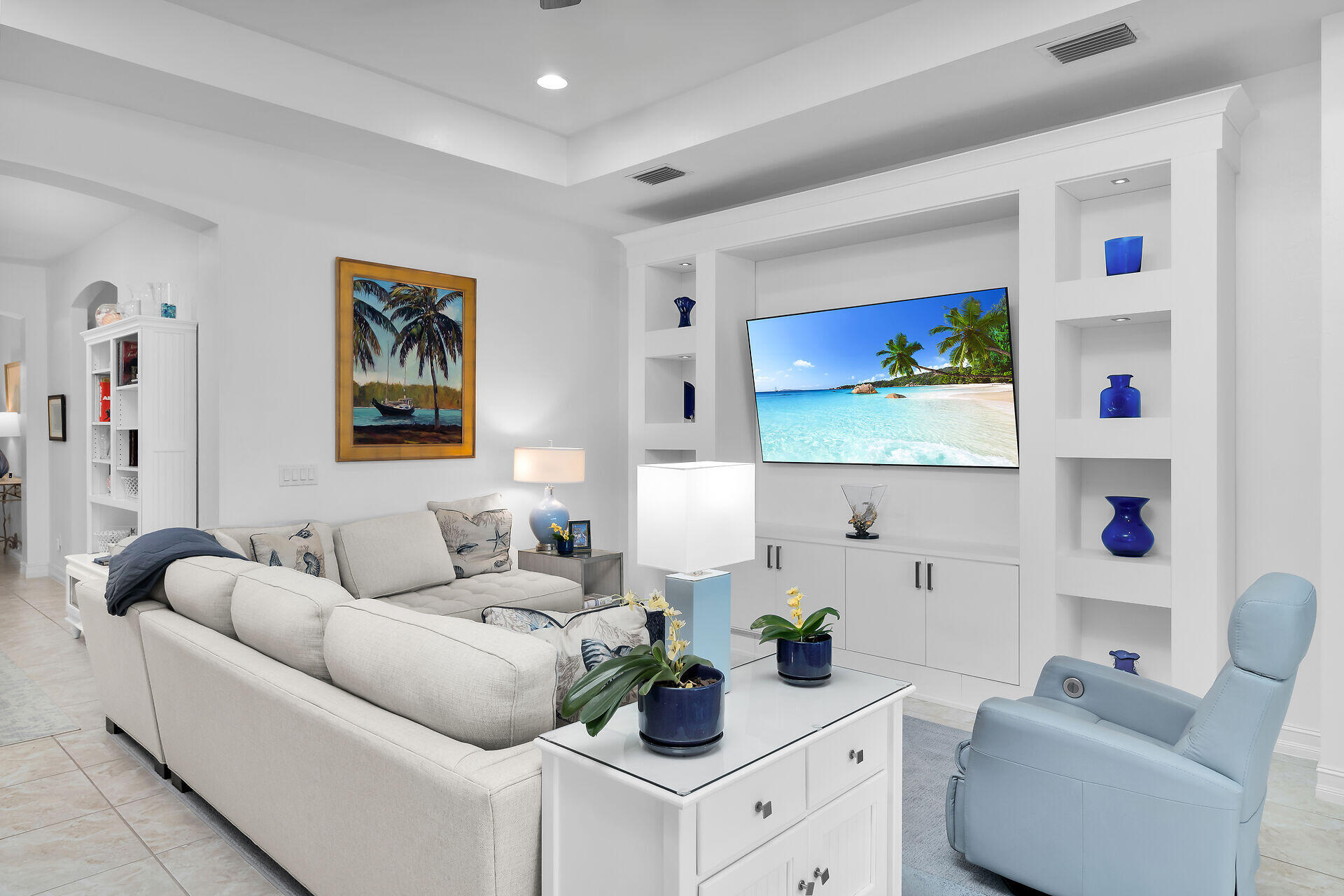 14730 Nautilus Place Naples, FL 34114 - Photo 7 of 56 a living room with furniture and a flat screen tv