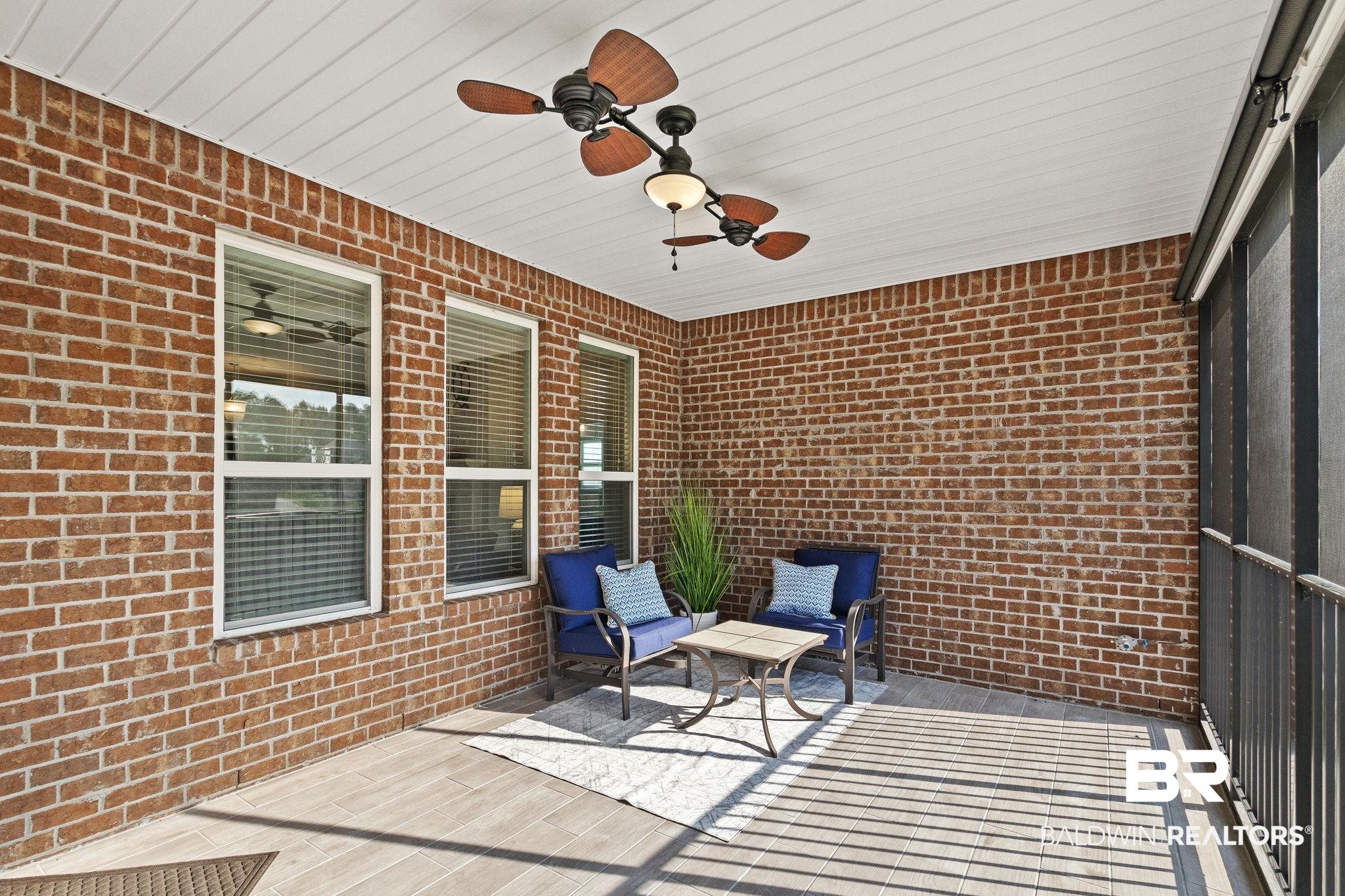 31541 Hoot Owl Road Daphne, AL 36527 - Photo 37 of 51 Unfurnished sunroom with ceiling fan and wood ceiling