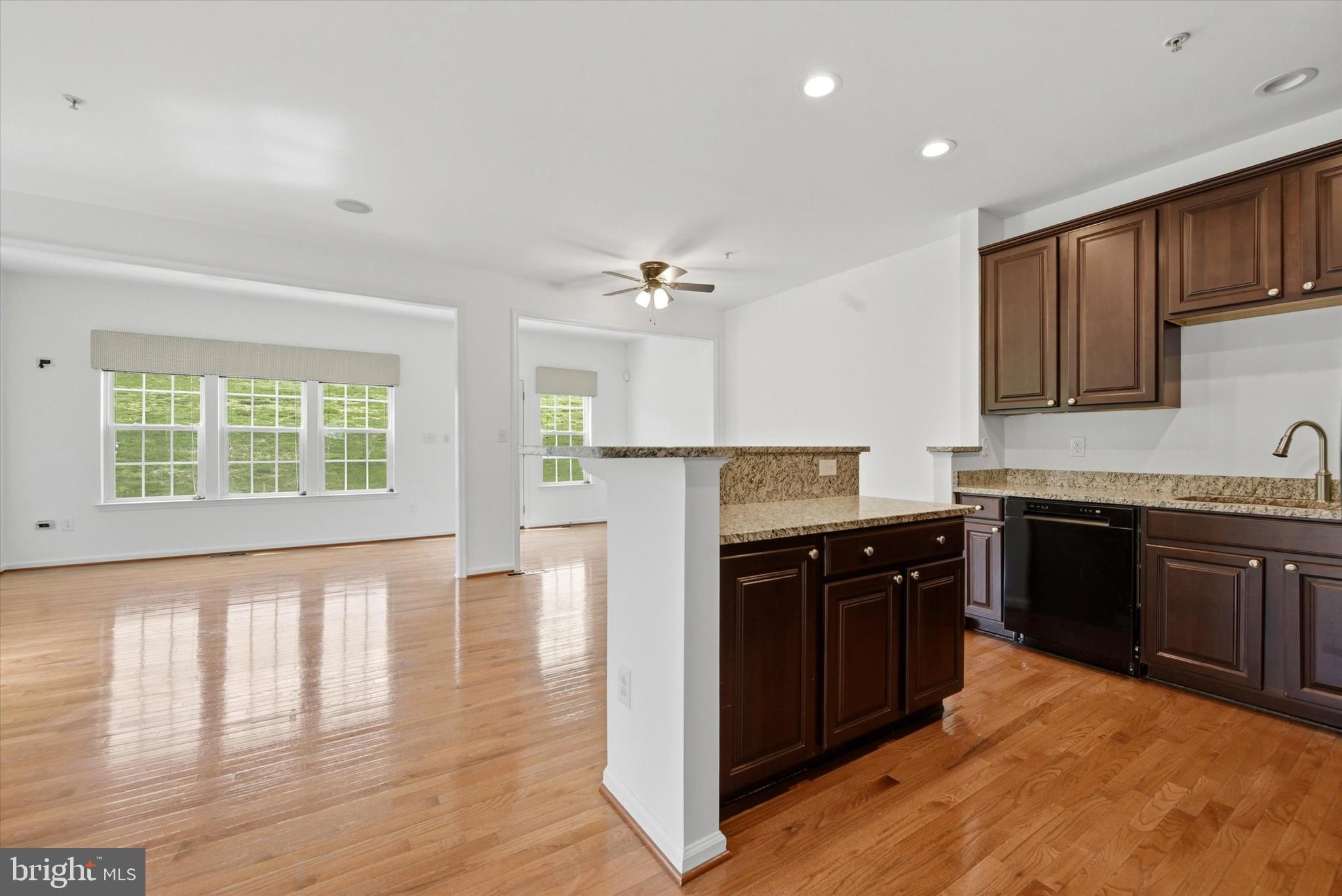 186 Tulsk Road Avondale, PA 19311 - Photo 15 of 38 a kitchen with stainless steel appliances granite countertop a stove a sink dishwasher and a refrigerator