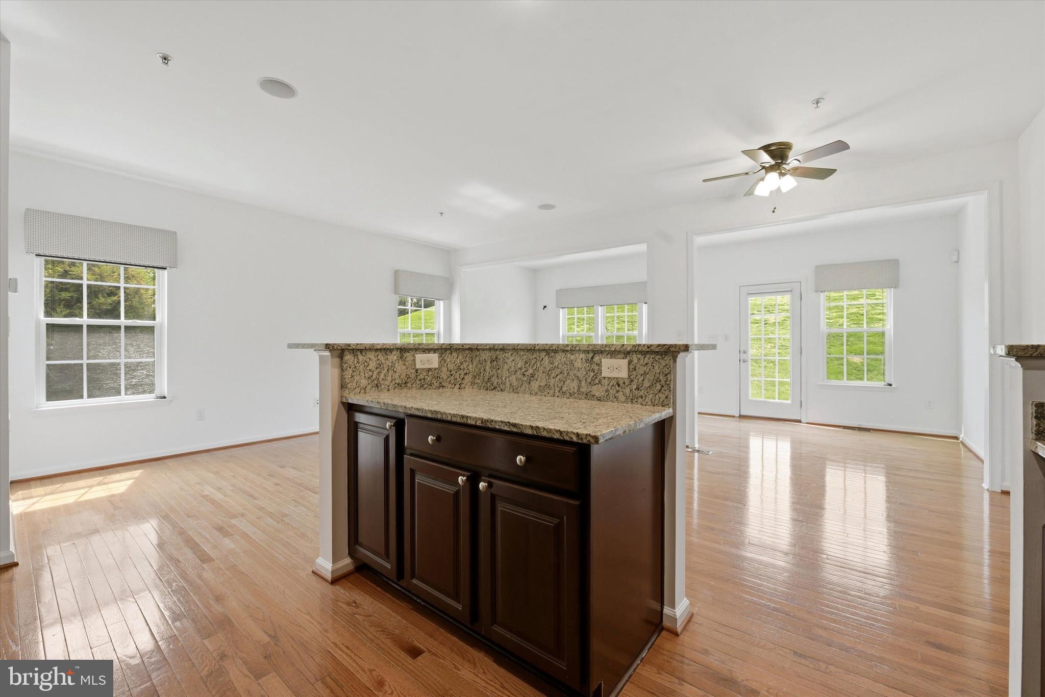 186 Tulsk Road Avondale, PA 19311 - Photo 16 of 38 an empty room with wooden floor and cabinet