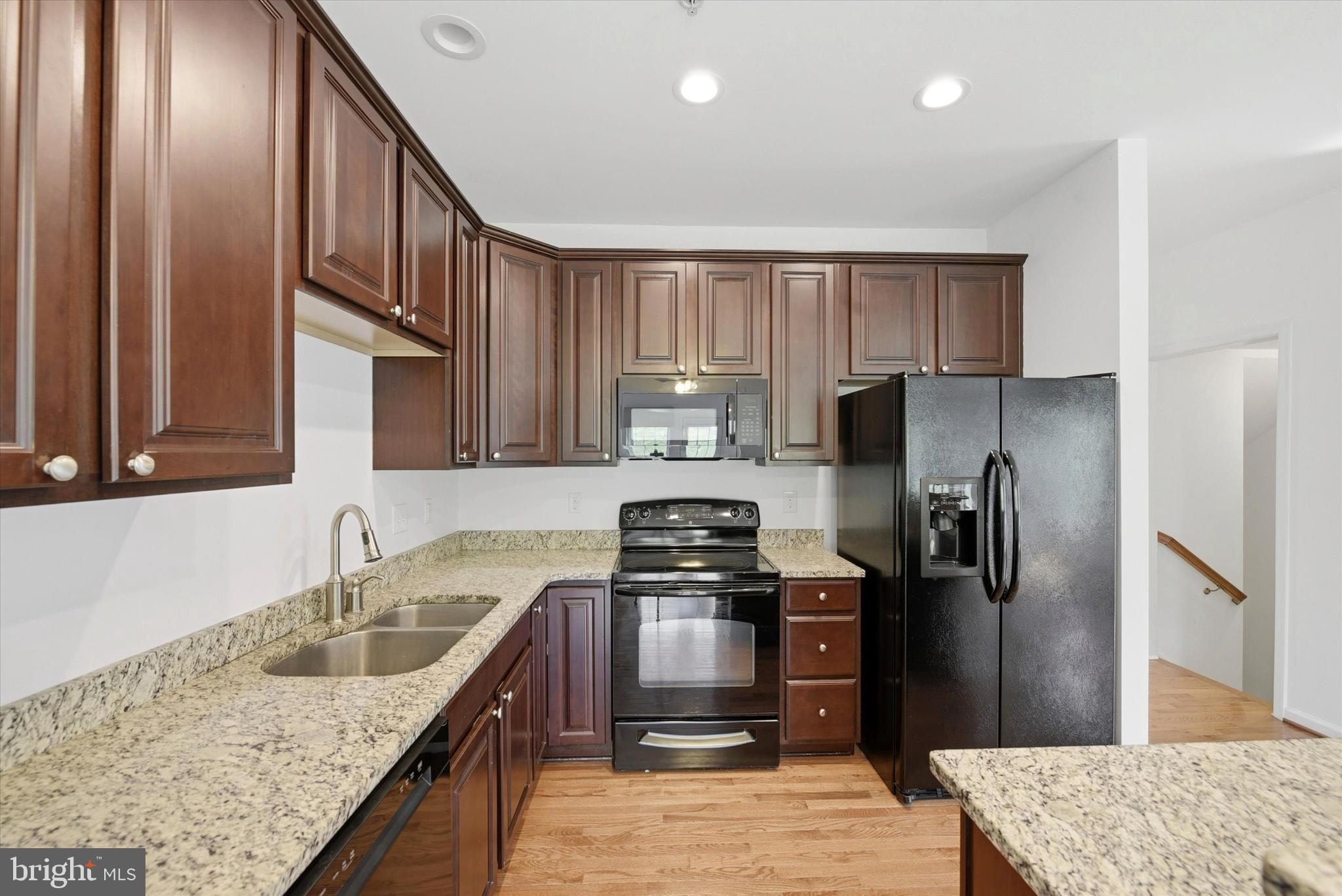 186 Tulsk Road Avondale, PA 19311 - Photo 18 of 38 a kitchen with granite countertop stainless steel appliances and a counter space