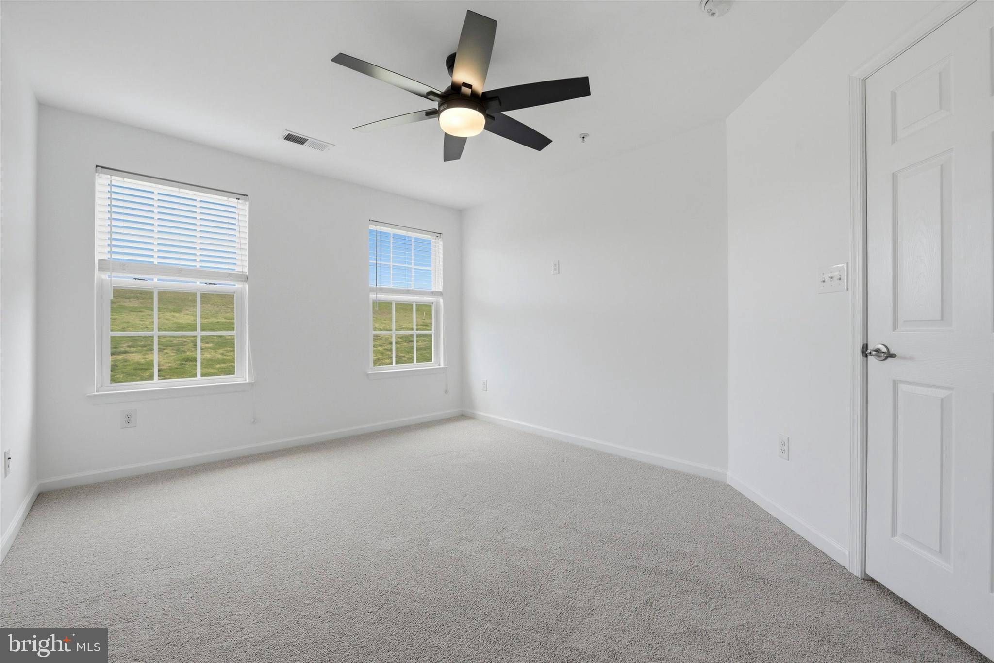 186 Tulsk Road Avondale, PA 19311 - Photo 27 of 38 an empty room with windows and fan
