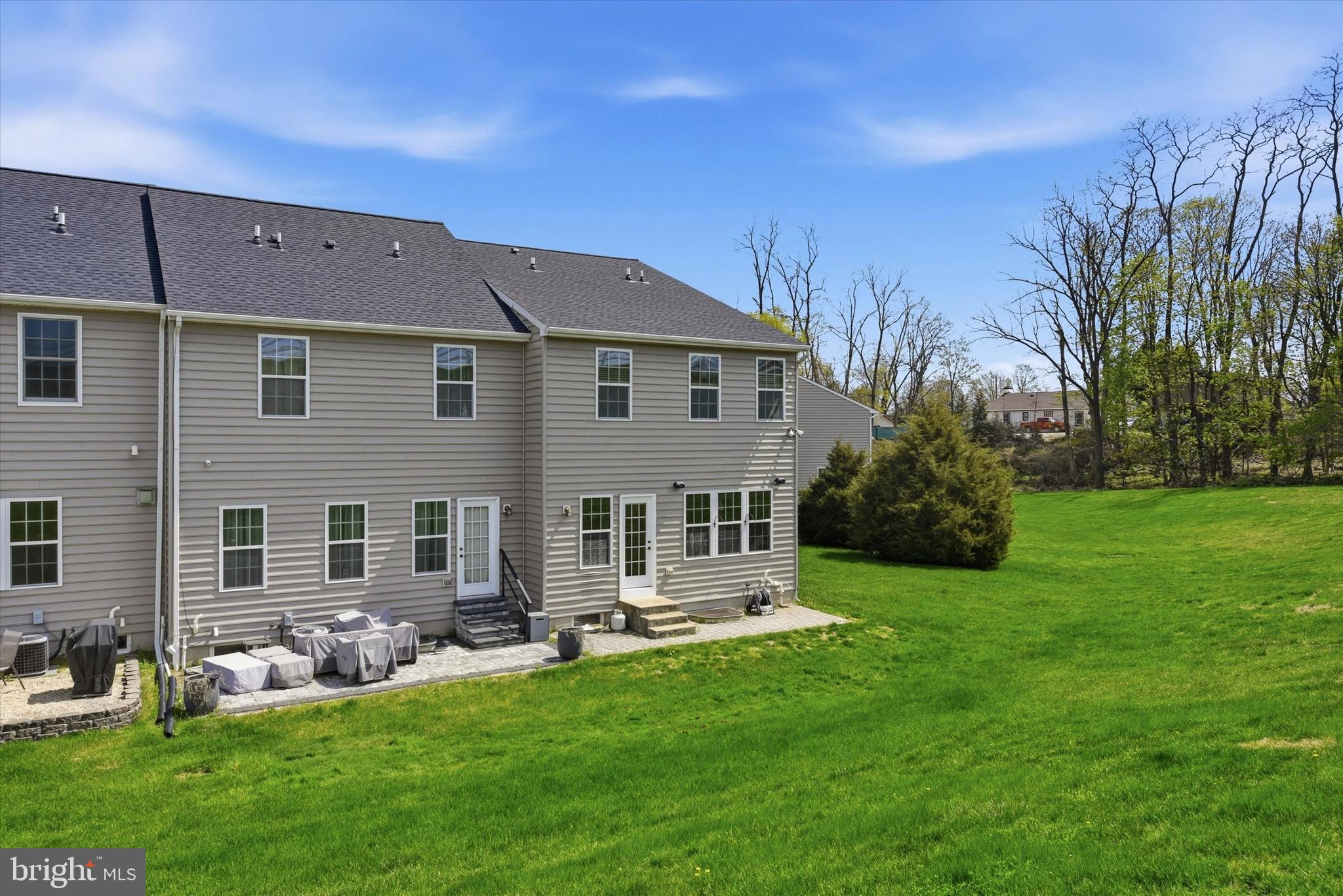 186 Tulsk Road Avondale, PA 19311 - Photo 5 of 38 a front view of a house with a garden and yard