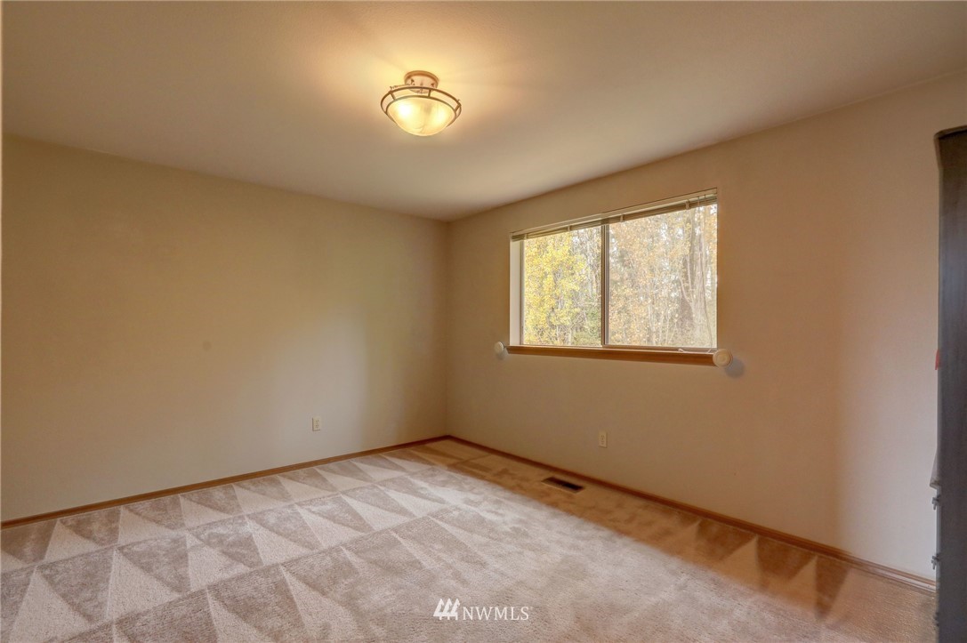 5142 South Garden Loop Road Seattle, WA 98118 - Photo 13 of 18 a view of empty room with windows