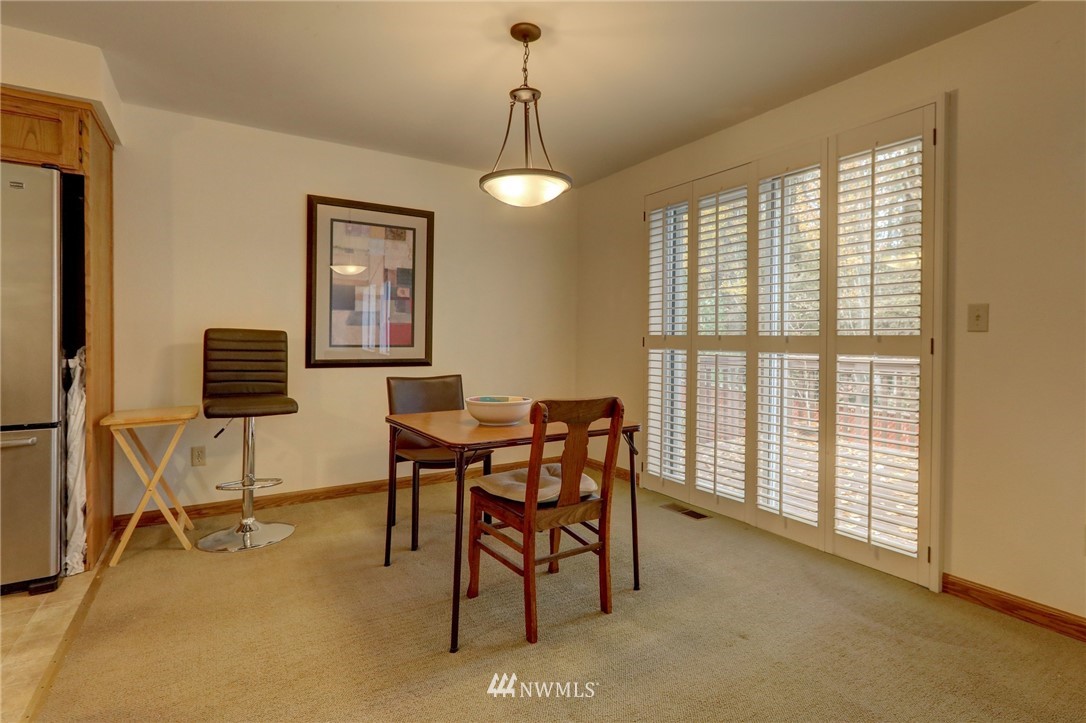 5142 South Garden Loop Road Seattle, WA 98118 - Photo 7 of 18 a view of a livingroom with furniture and a window