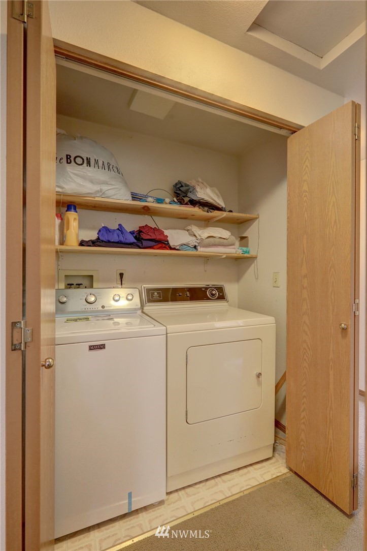 5142 South Garden Loop Road Seattle, WA 98118 - Photo 9 of 18 a utility room with dryer and washer