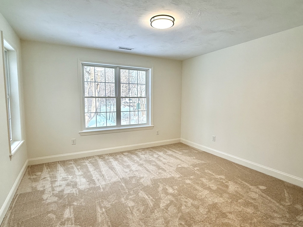 28 Forest Hill Drive Rutland, MA 01543 - Photo 18 of 23 an empty room with a window