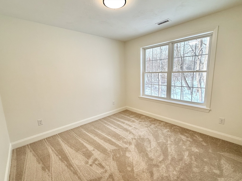 28 Forest Hill Drive Rutland, MA 01543 - Photo 19 of 23 a view of an empty room with a window