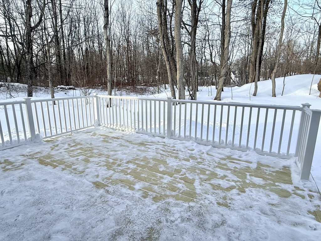 28 Forest Hill Drive Rutland, MA 01543 - Photo 23 of 23 a view of a yard with wooden fence