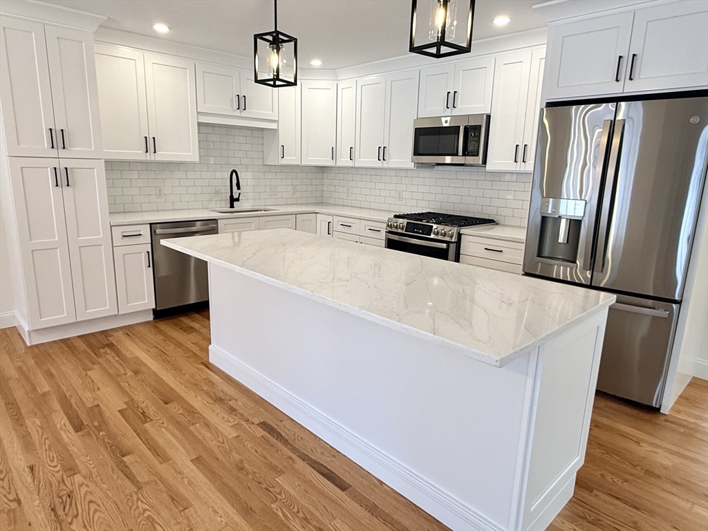 28 Forest Hill Drive Rutland, MA 01543 - Photo 3 of 23 a kitchen with stainless steel appliances a refrigerator sink and microwave