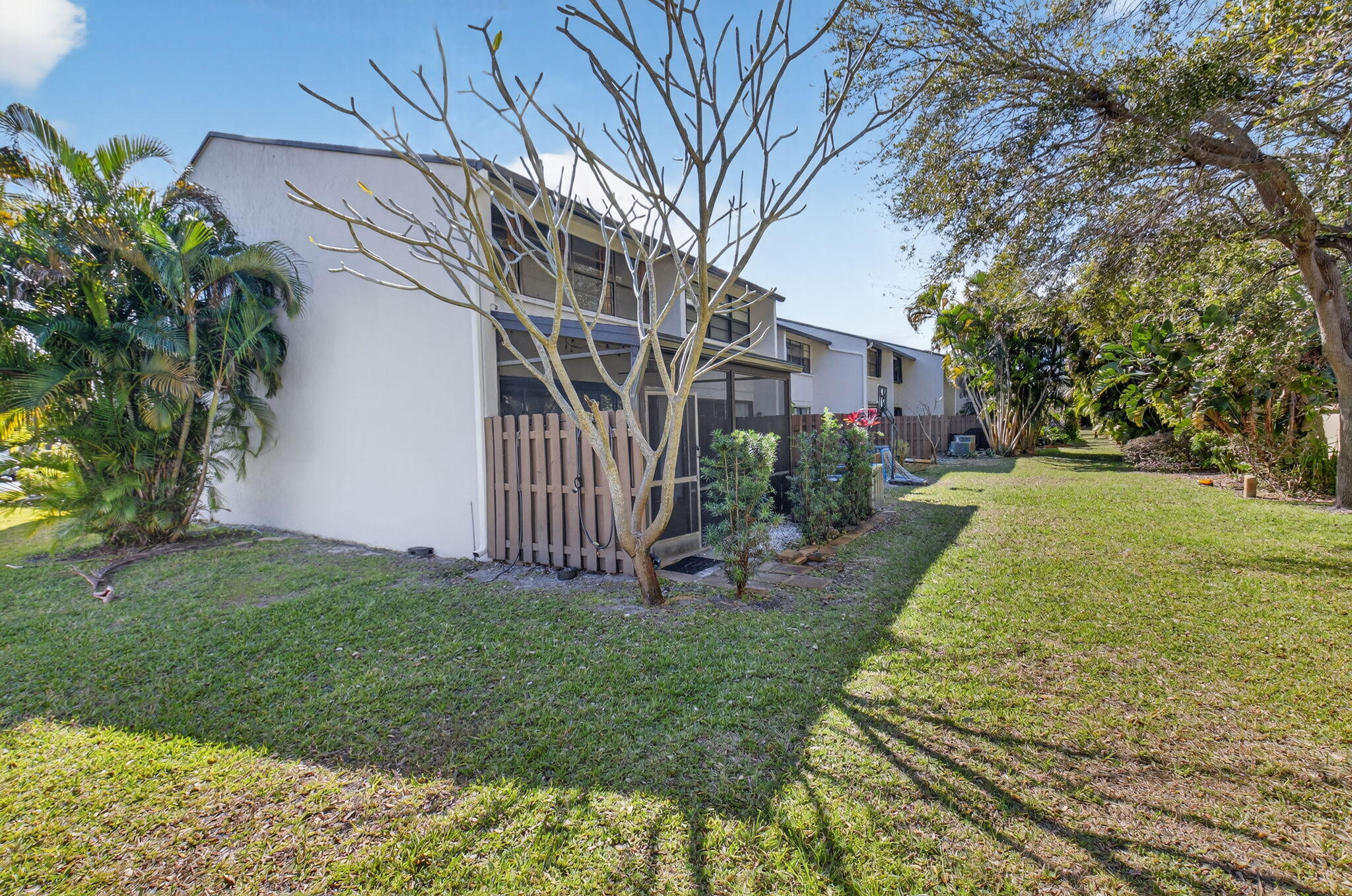 4761 Northwest 2nd Avenue, Unit 301 Boca Raton, FL 33431 - Photo 31 of 56 a view of a back yard of the house