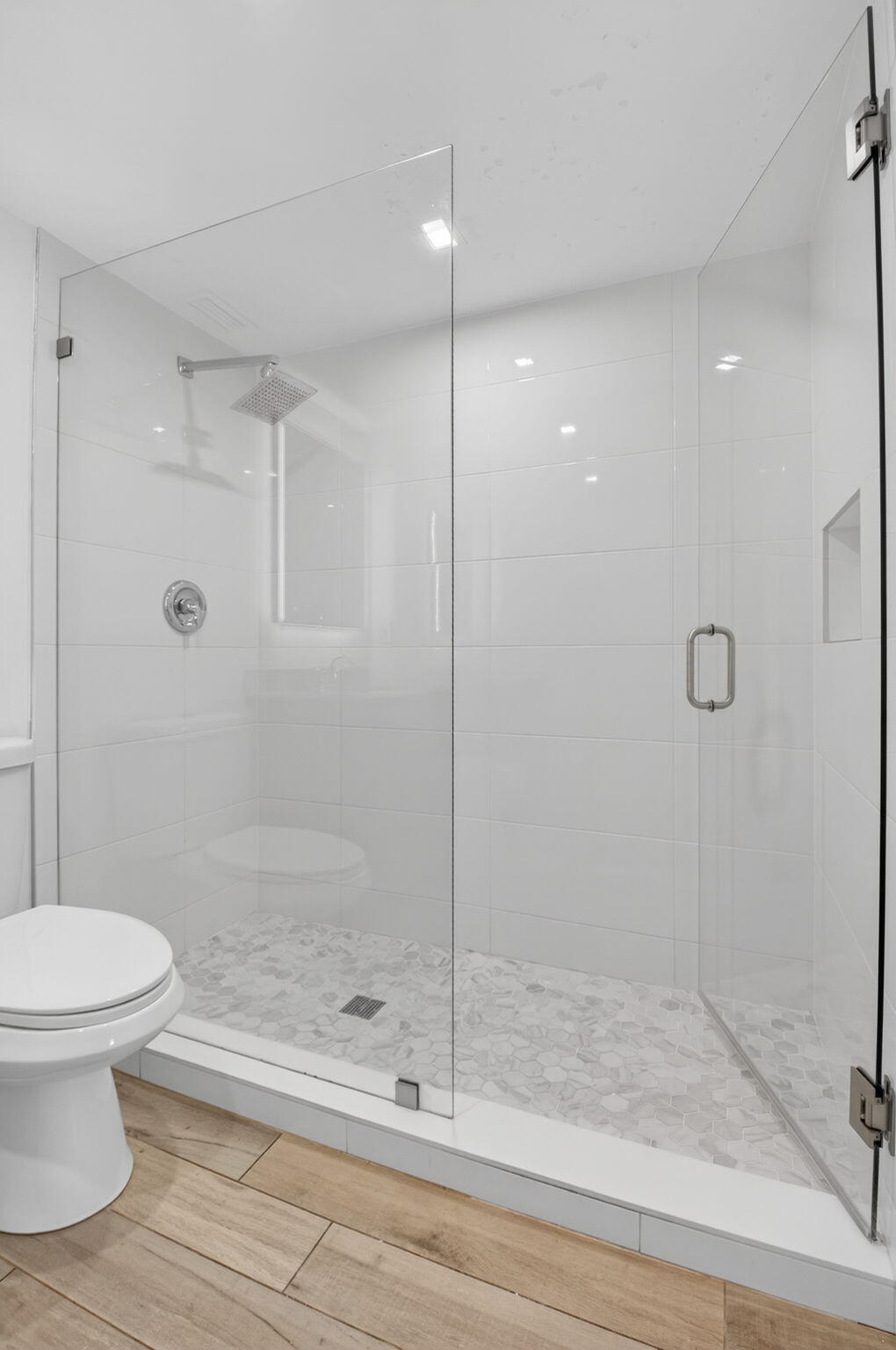 4761 Northwest 2nd Avenue, Unit 301 Boca Raton, FL 33431 - Photo 38 of 56 a bathroom with a shower and toilet