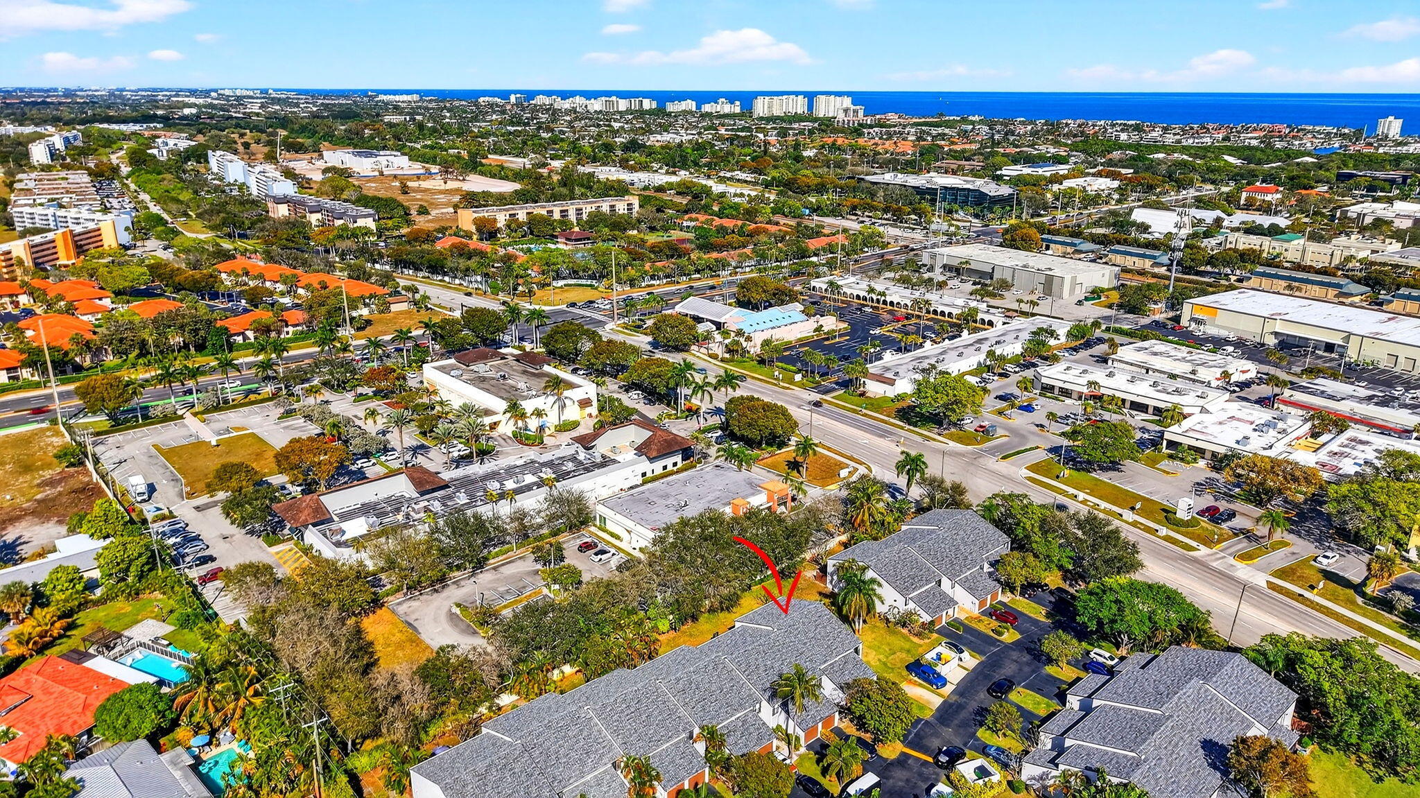 4761 Northwest 2nd Avenue, Unit 301 Boca Raton, FL 33431 - Photo 50 of 56 an aerial view of residential houses with city view