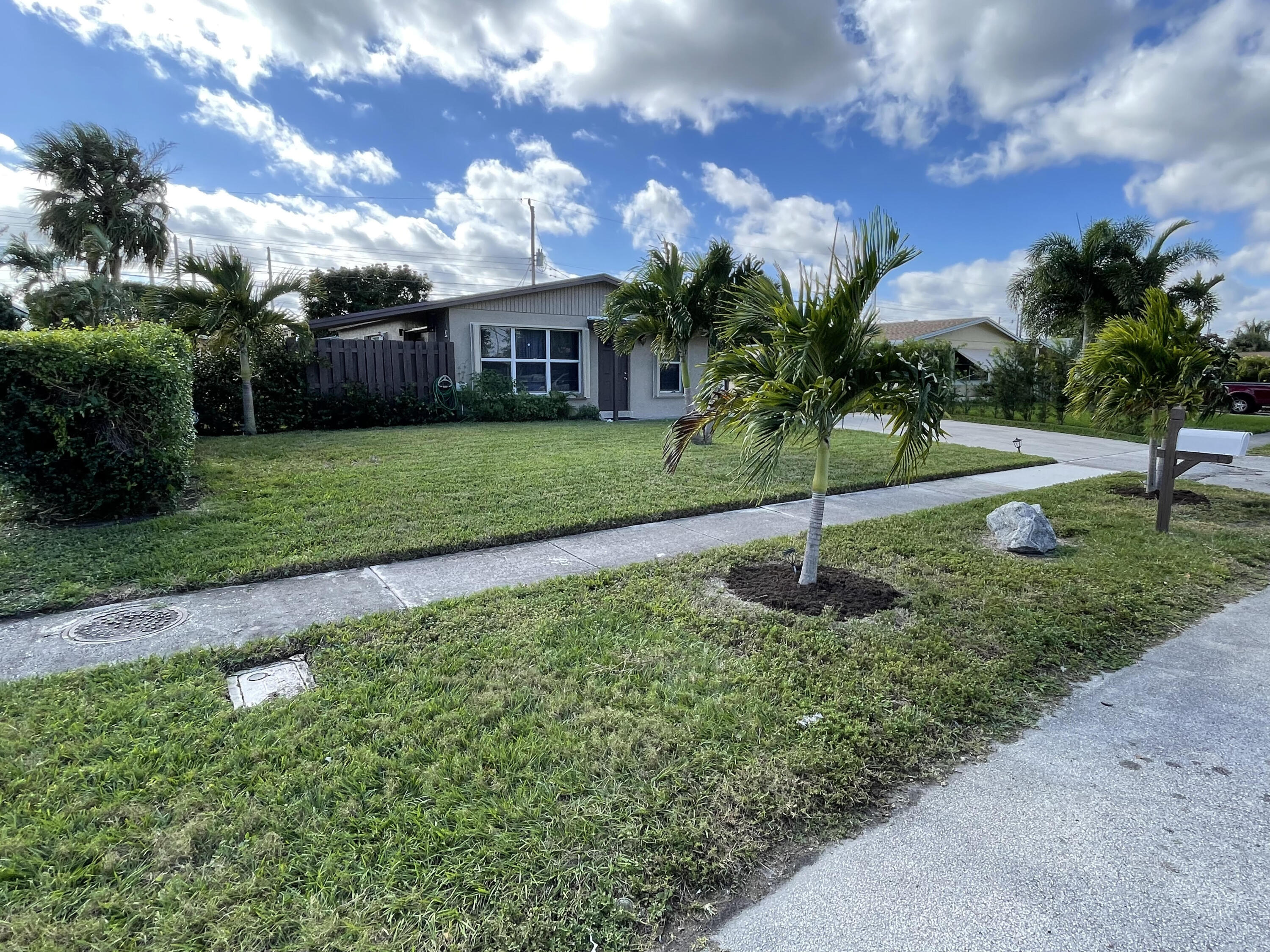 1211 West 2nd Street Riviera Beach, FL 33404 - Photo 5 of 30 MLS STREET VIEW LAWN