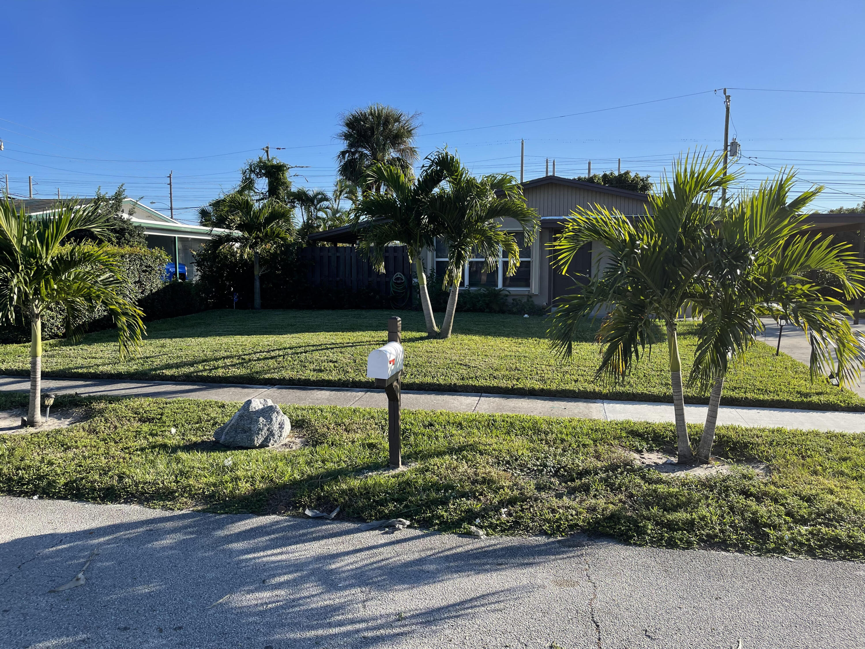 1211 West 2nd Street Riviera Beach, FL 33404 - Photo 6 of 30 MLS FRONT LAWN