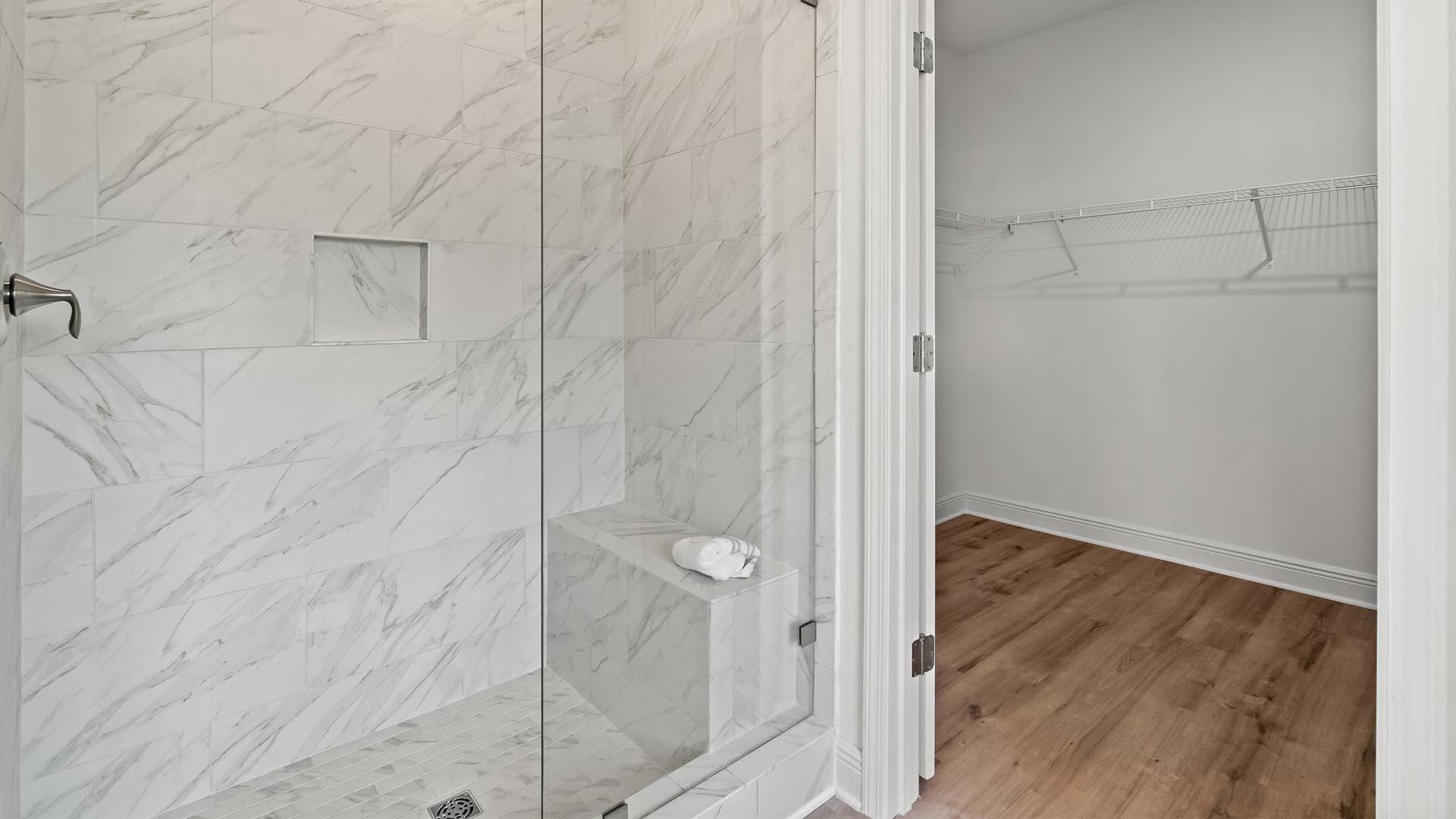 49 West Farm Owl Drive Freeport, FL 32439 - Photo 18 of 32 a bathroom with a glass shower door