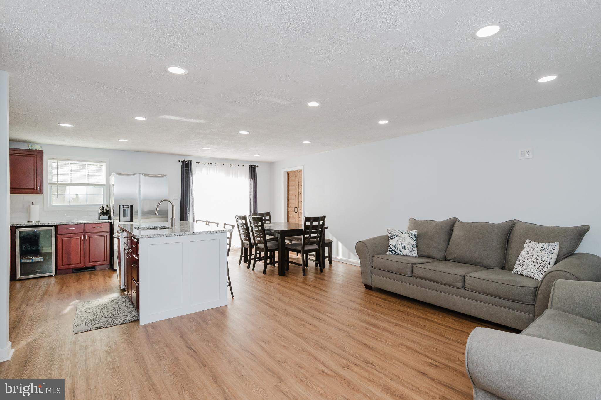 930 Edmund Street Aberdeen, MD 21001 - Photo 15 of 61 a living room with furniture and a wooden floor