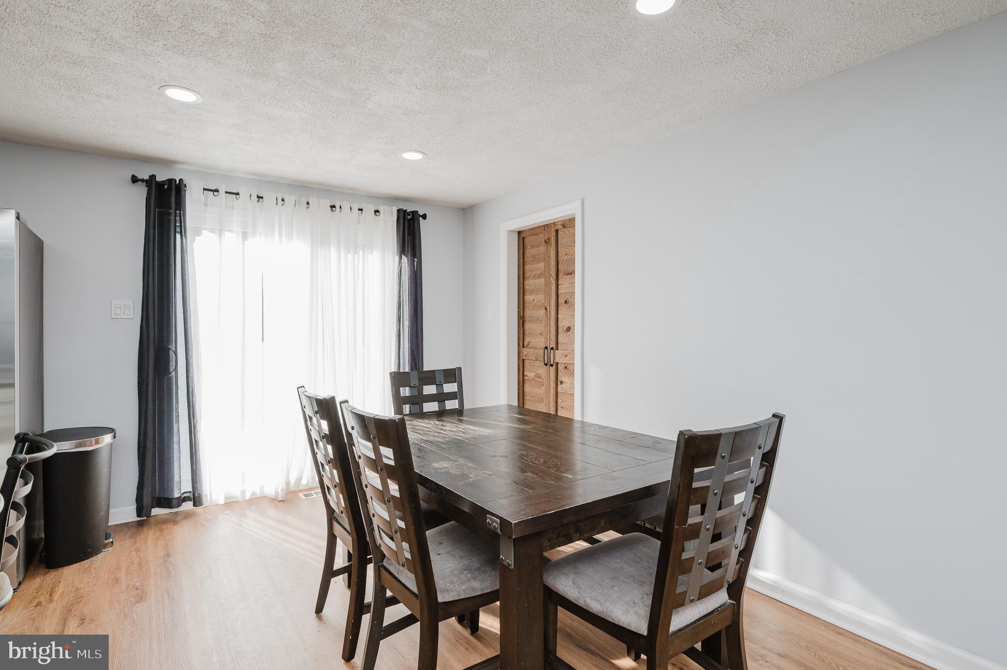 930 Edmund Street Aberdeen, MD 21001 - Photo 19 of 61 a view of a dining room with furniture
