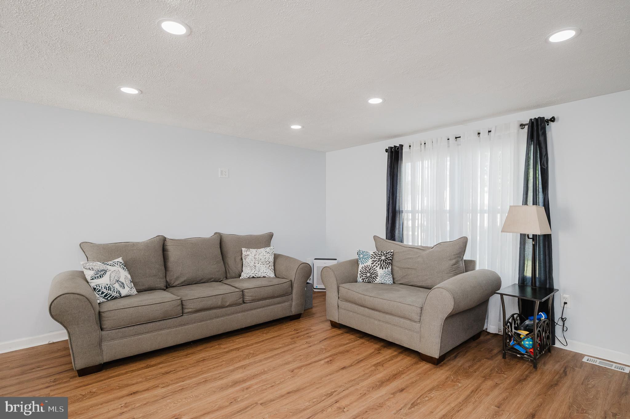 930 Edmund Street Aberdeen, MD 21001 - Photo 21 of 61 a living room with furniture and a couch