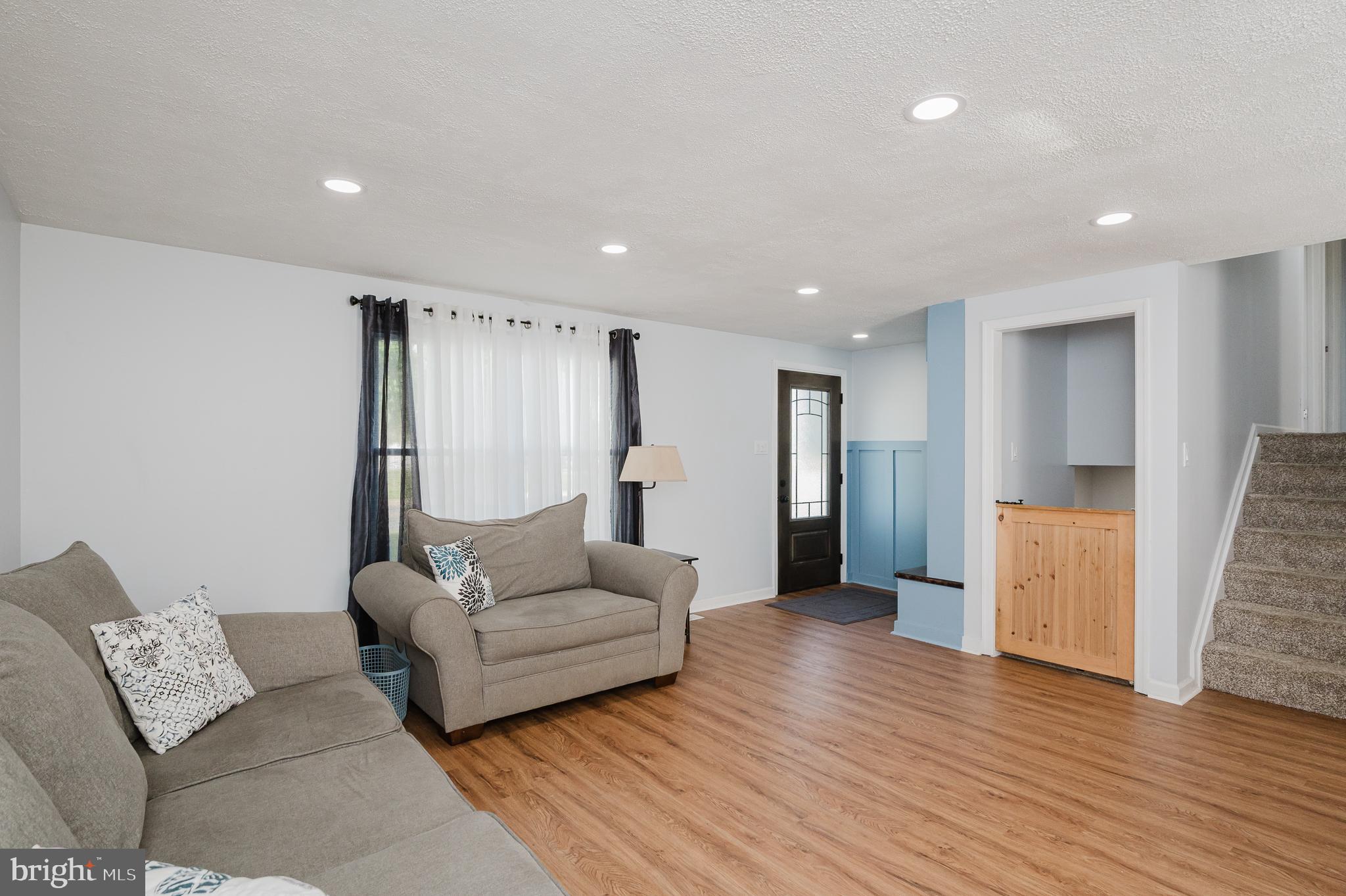 930 Edmund Street Aberdeen, MD 21001 - Photo 22 of 61 a living room with furniture and a wooden floor