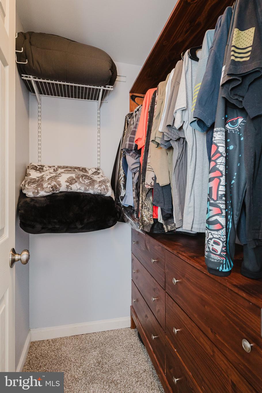 930 Edmund Street Aberdeen, MD 21001 - Photo 29 of 61 a view of walk in closet with clothes and shoes