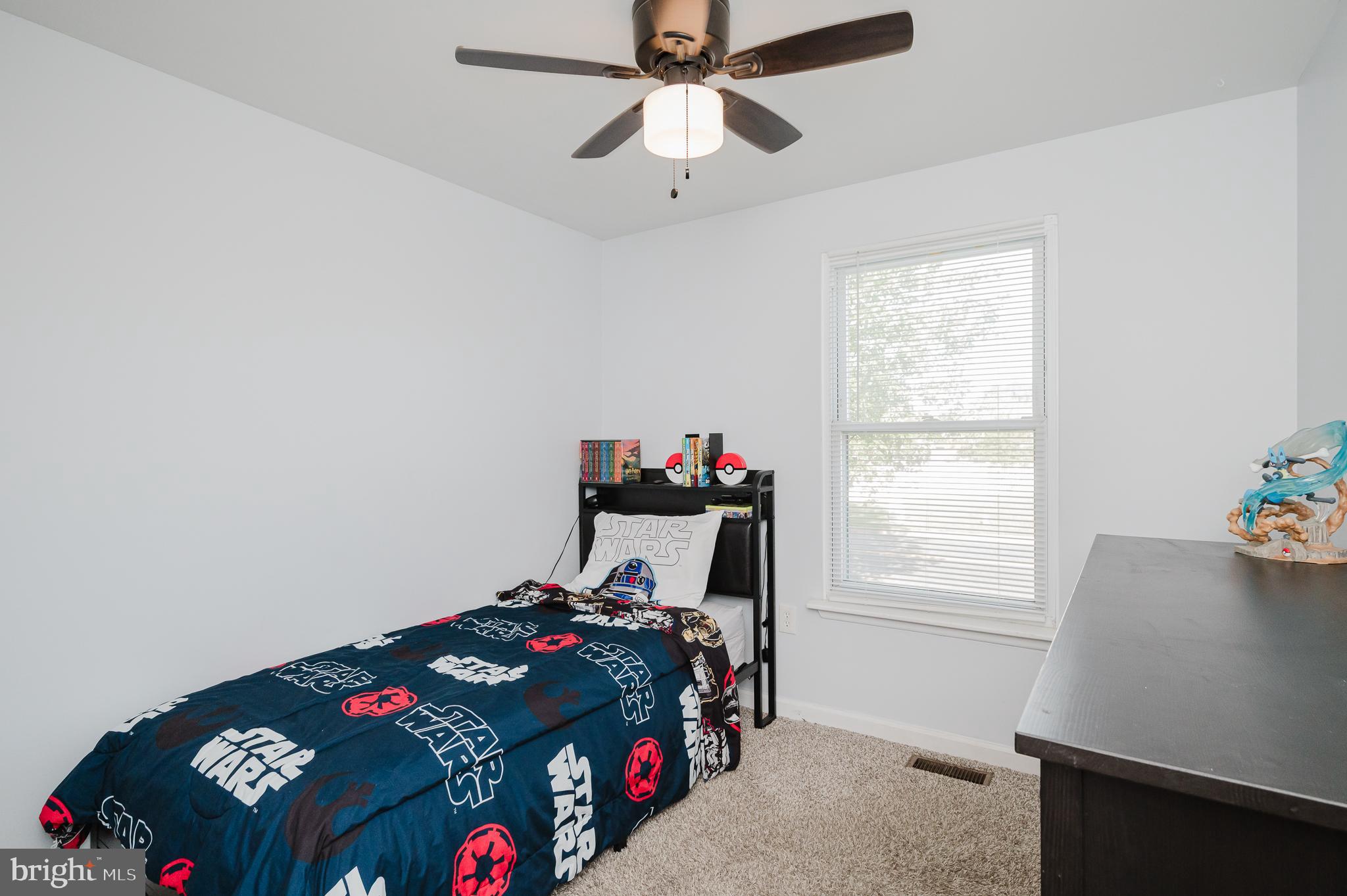 930 Edmund Street Aberdeen, MD 21001 - Photo 35 of 61 a bedroom with a bed and a window
