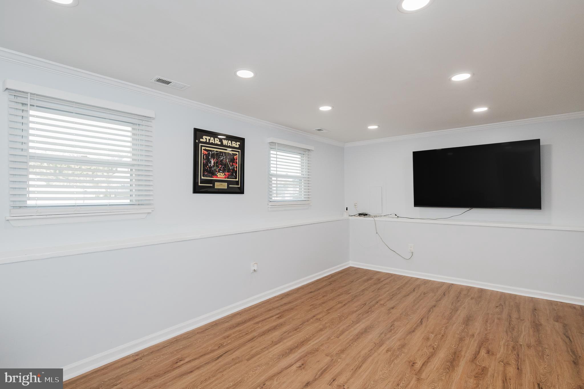 930 Edmund Street Aberdeen, MD 21001 - Photo 38 of 61 a view of a livingroom with wooden floor and window
