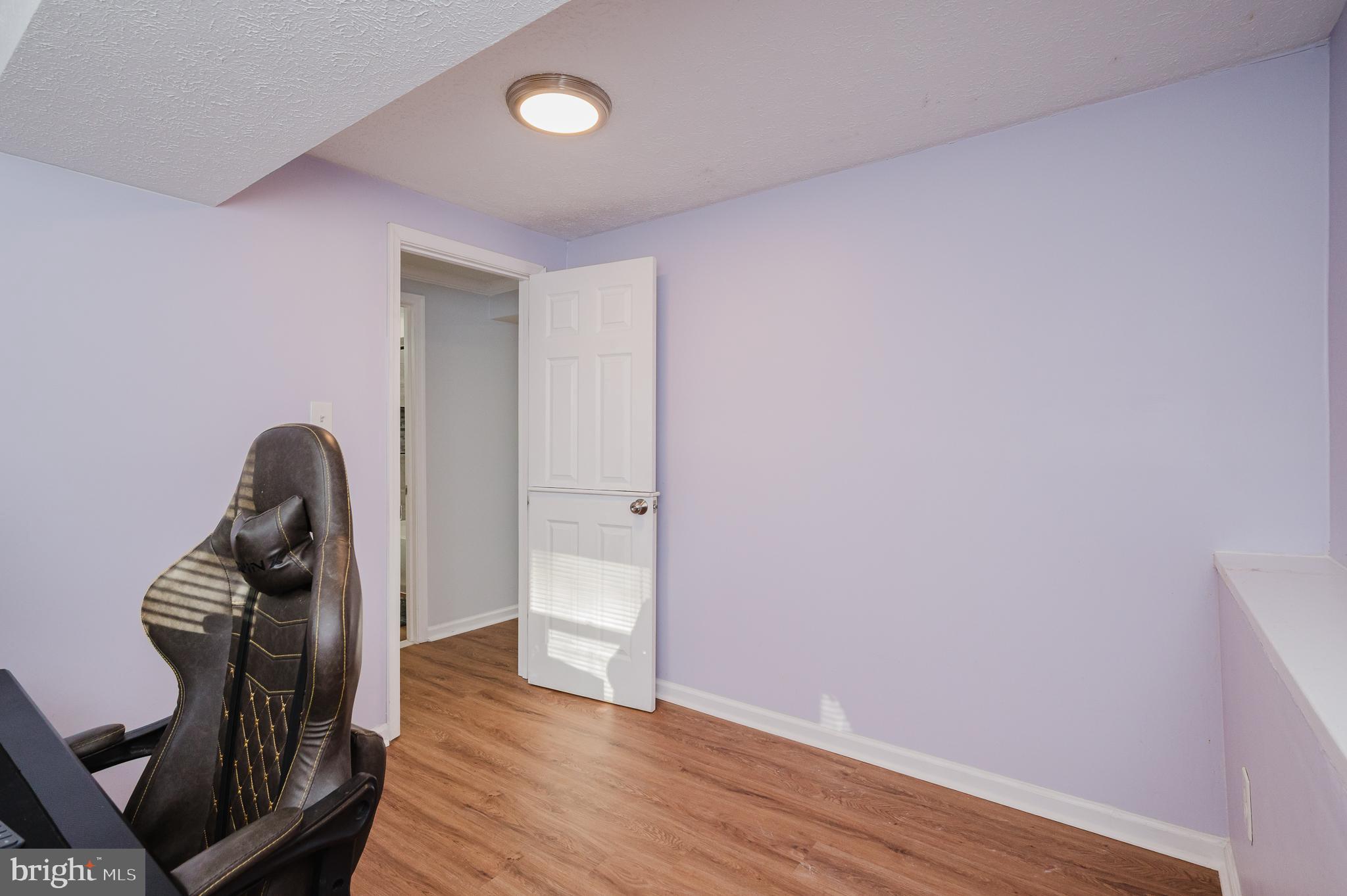 930 Edmund Street Aberdeen, MD 21001 - Photo 45 of 61 a view of walk in closet with clothes and shoes