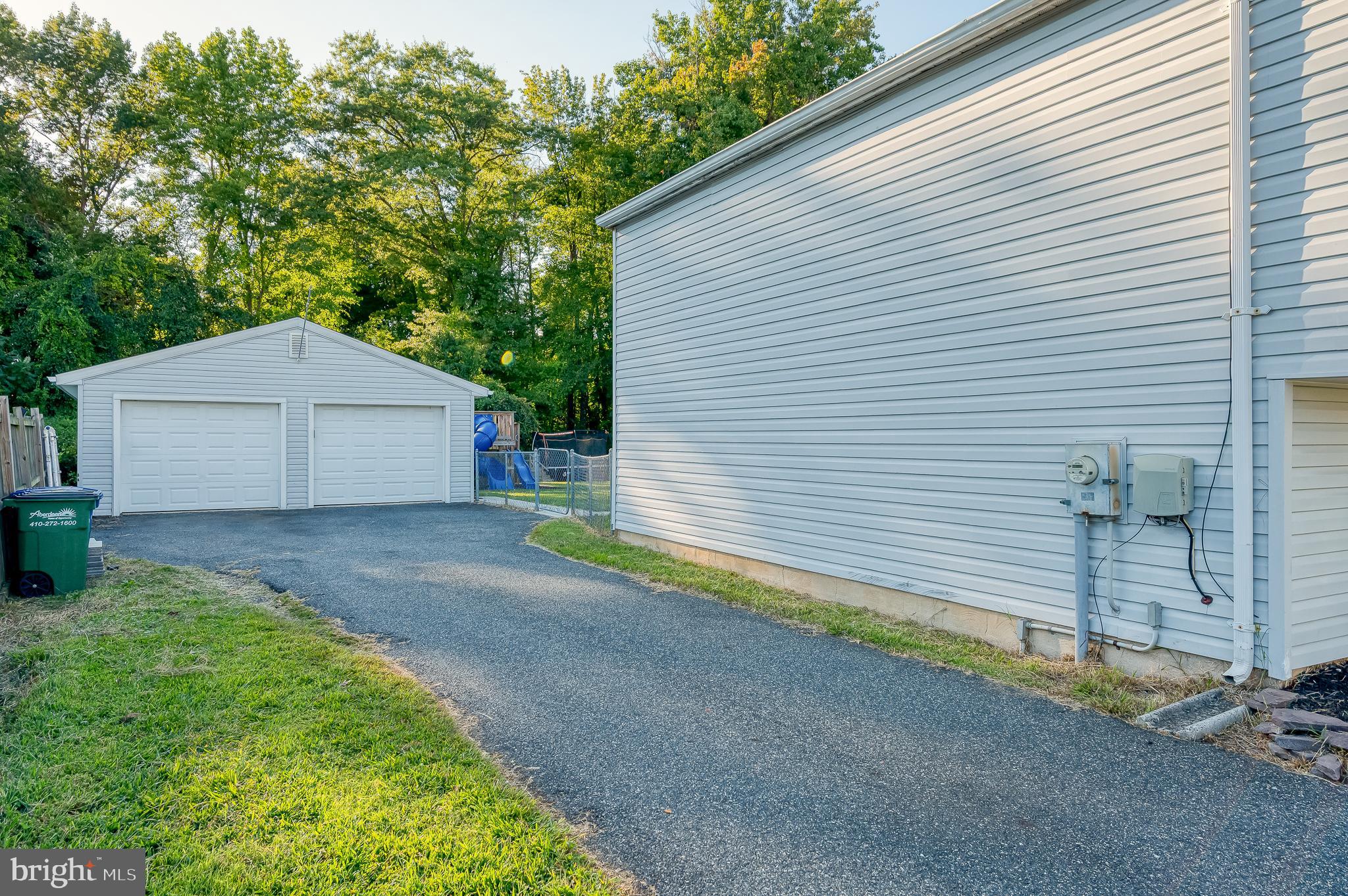 930 Edmund Street Aberdeen, MD 21001 - Photo 53 of 61 a front view of a house with a yard and garage