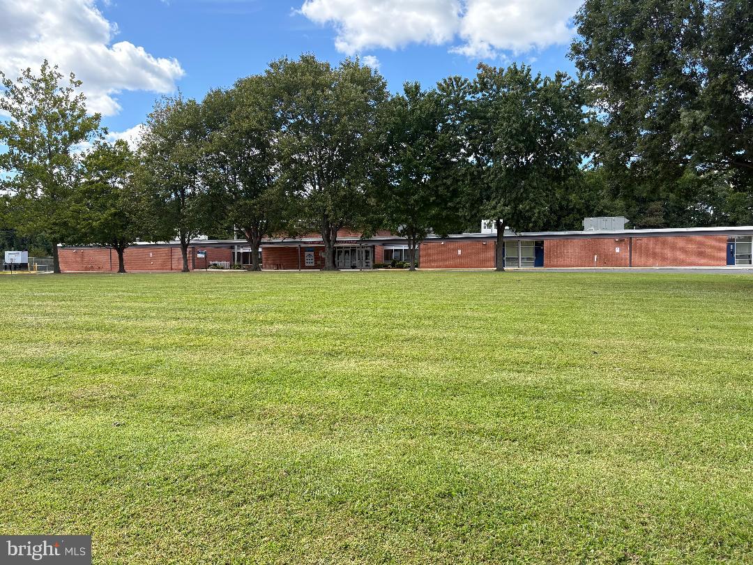 930 Edmund Street Aberdeen, MD 21001 - Photo 59 of 61 a view of a green field with trees in the background