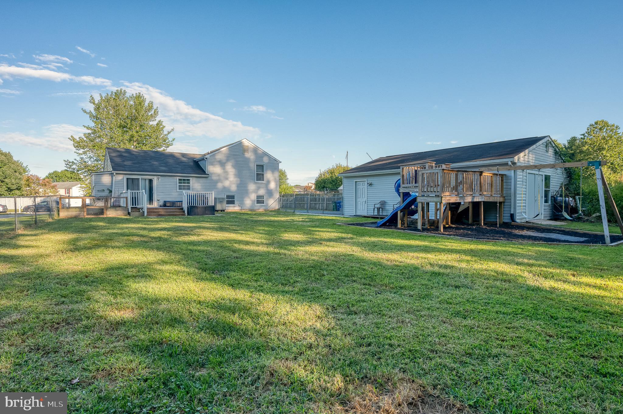 930 Edmund Street Aberdeen, MD 21001 - Photo 8 of 61 a view of an house with swimming pool and a yard