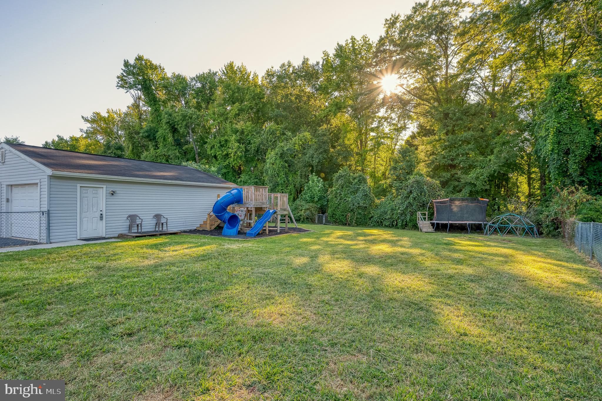 930 Edmund Street Aberdeen, MD 21001 - Photo 10 of 61 a view of a backyard with a garden and trees