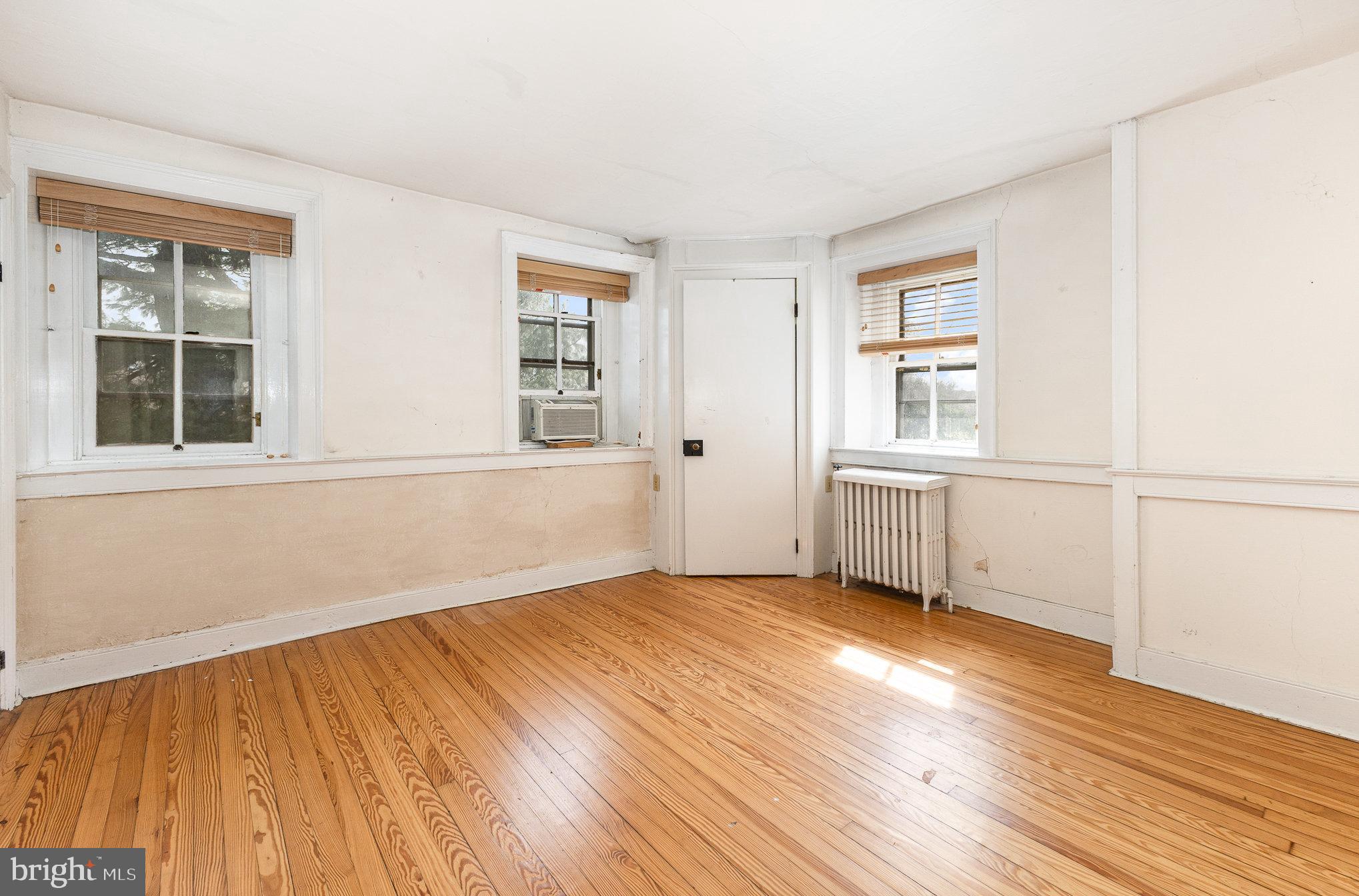 2500 Doehne Road Harrisburg, PA 17110 - Photo 18 of 42 an empty room with wooden floor and windows