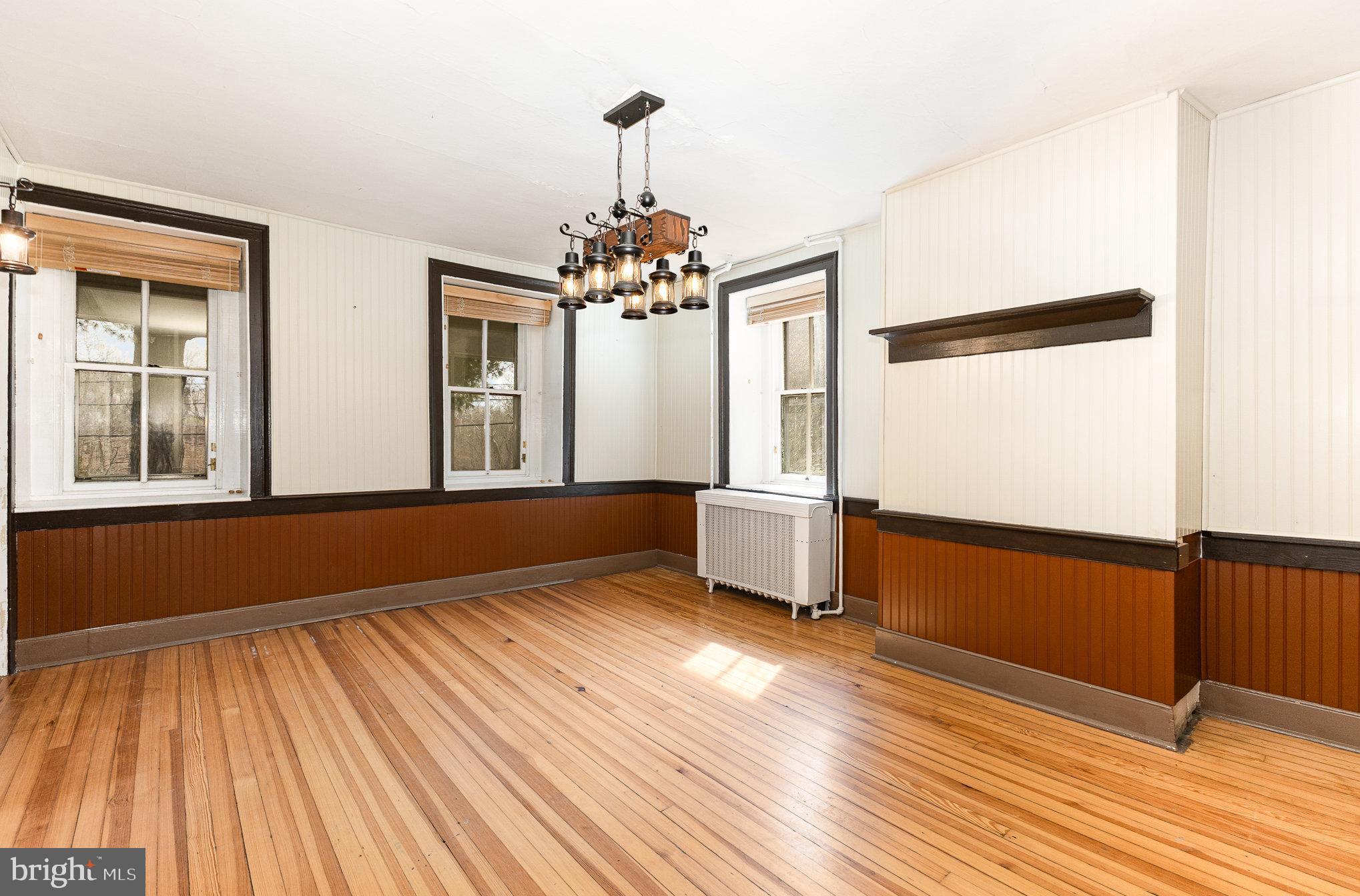 2500 Doehne Road Harrisburg, PA 17110 - Photo 9 of 42 a view of a room with wooden floor staircase and a kitchen