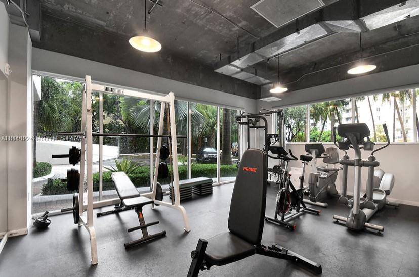 1688 West Avenue, Unit 602 Miami Beach, FL 33139 - Photo 56 of 61 a view of a room with gym equipment