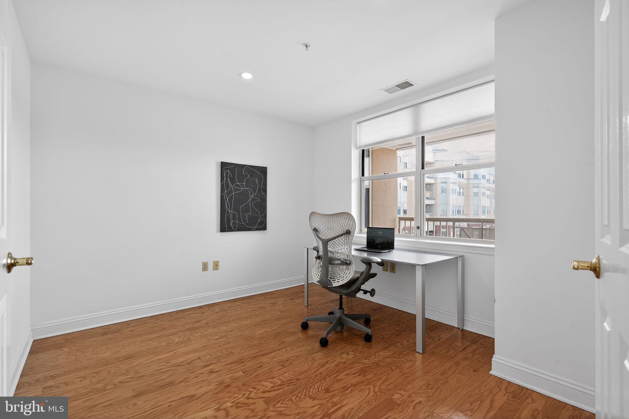 2205 Windrow Drive Princeton, NJ 08540 - Photo 19 of 24 a view of a workspace with furniture and a window