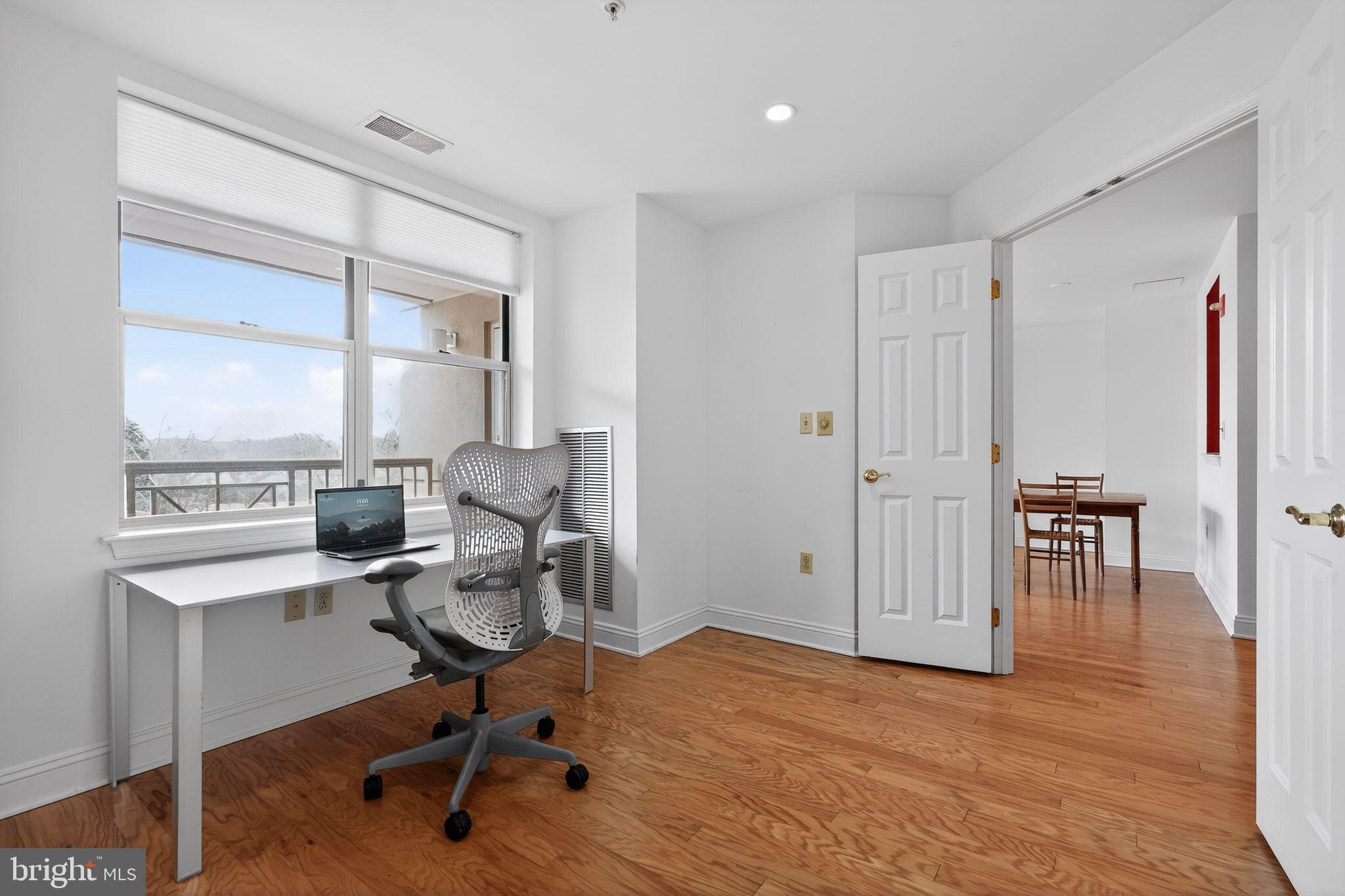 2205 Windrow Drive Princeton, NJ 08540 - Photo 20 of 24 a view of a workspace with furniture and a window
