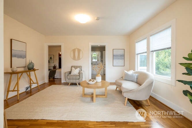 9340 45th Avenue Southwest Seattle, WA 98136 - Photo 12 of 33 a living room with furniture and a large window