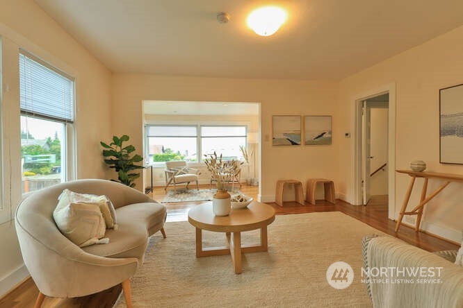 9340 45th Avenue Southwest Seattle, WA 98136 - Photo 23 of 33 a living room with furniture and a large window