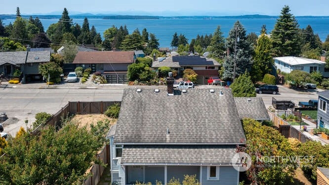 9340 45th Avenue Southwest Seattle, WA 98136 - Photo 6 of 33 an aerial view of a house with a garden and lake view